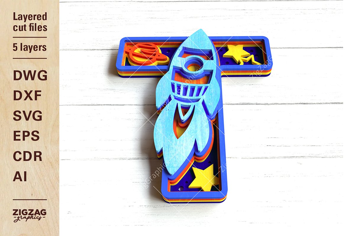 layered kids letter T with space rocket astronaut and stars