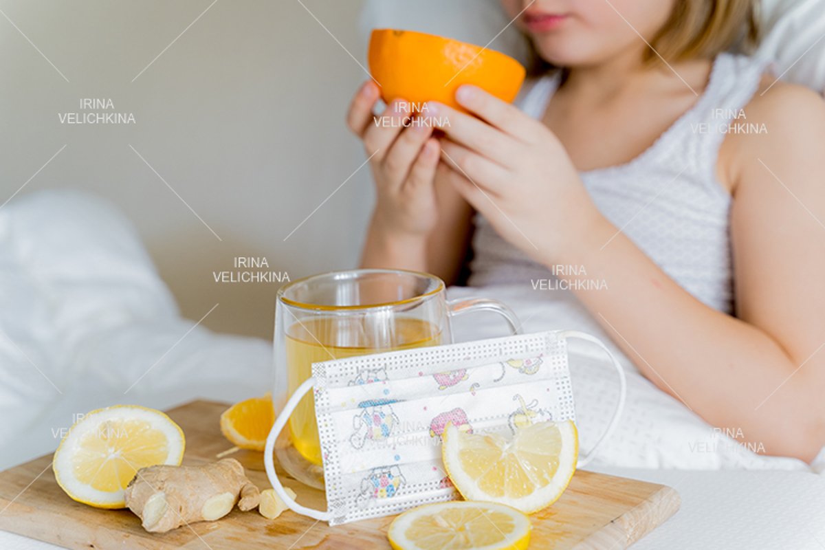 Cup of flu drugs, kids face mask. Tea, orange,lemon,ginger example image 1