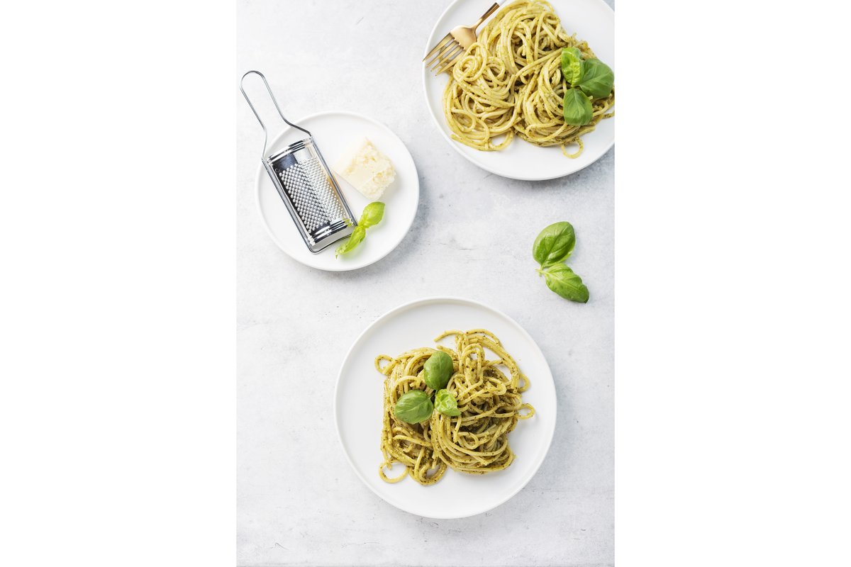 Italian spaghetti with pesto sause and parmesan cheese example image 1
