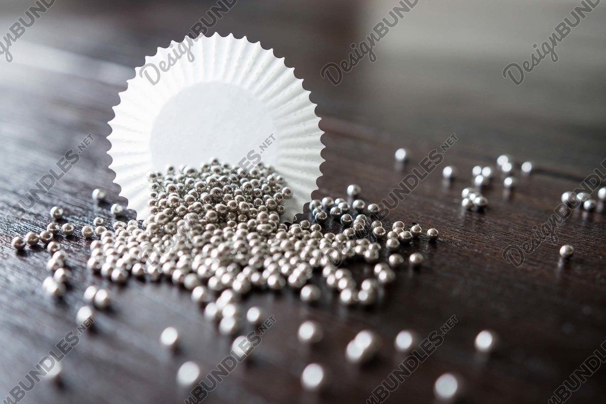Stock Photo - Beads spilled on the table example image 1