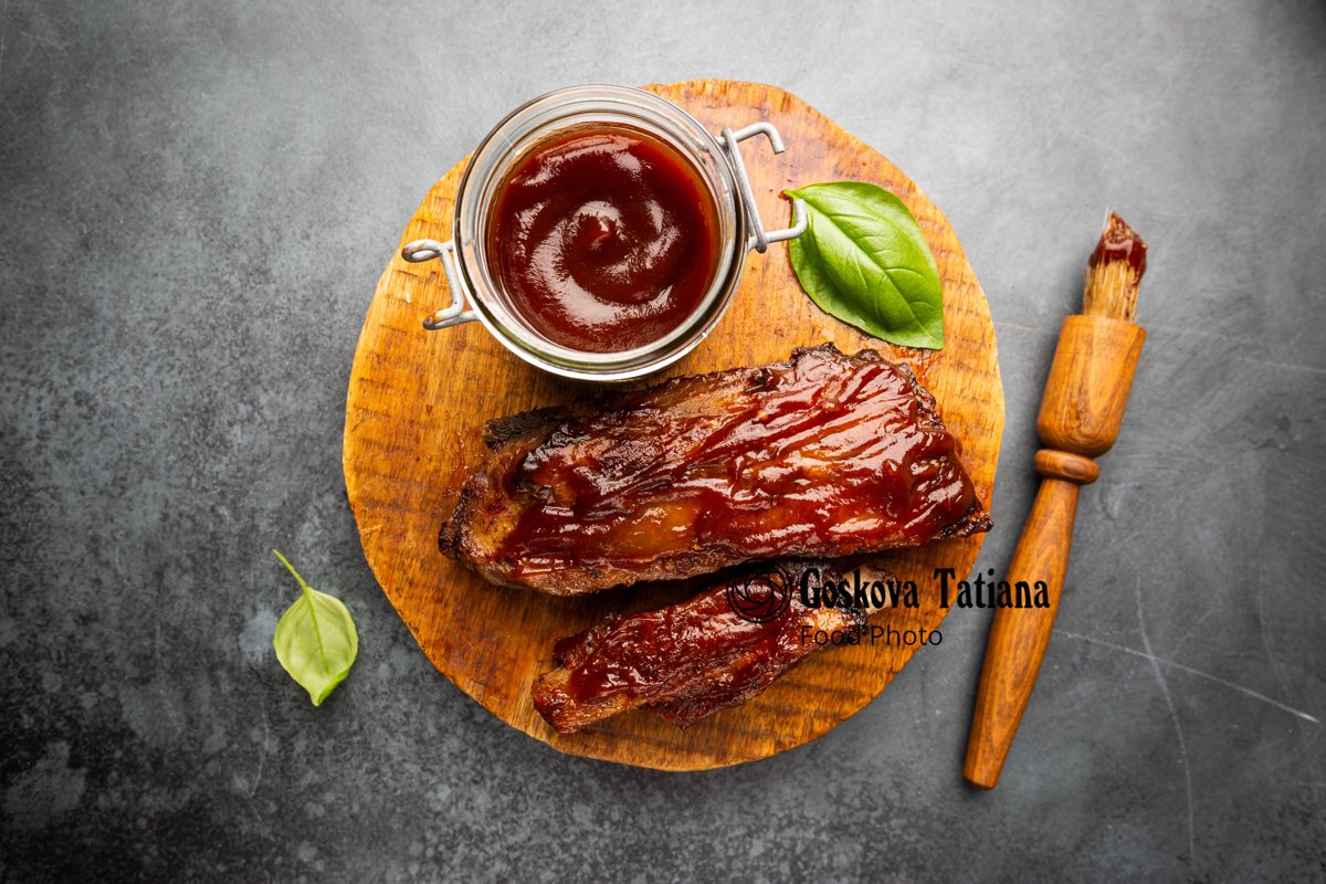 Photo of Delicious BBQ baby-back ribs with tangy sauce example image 1
