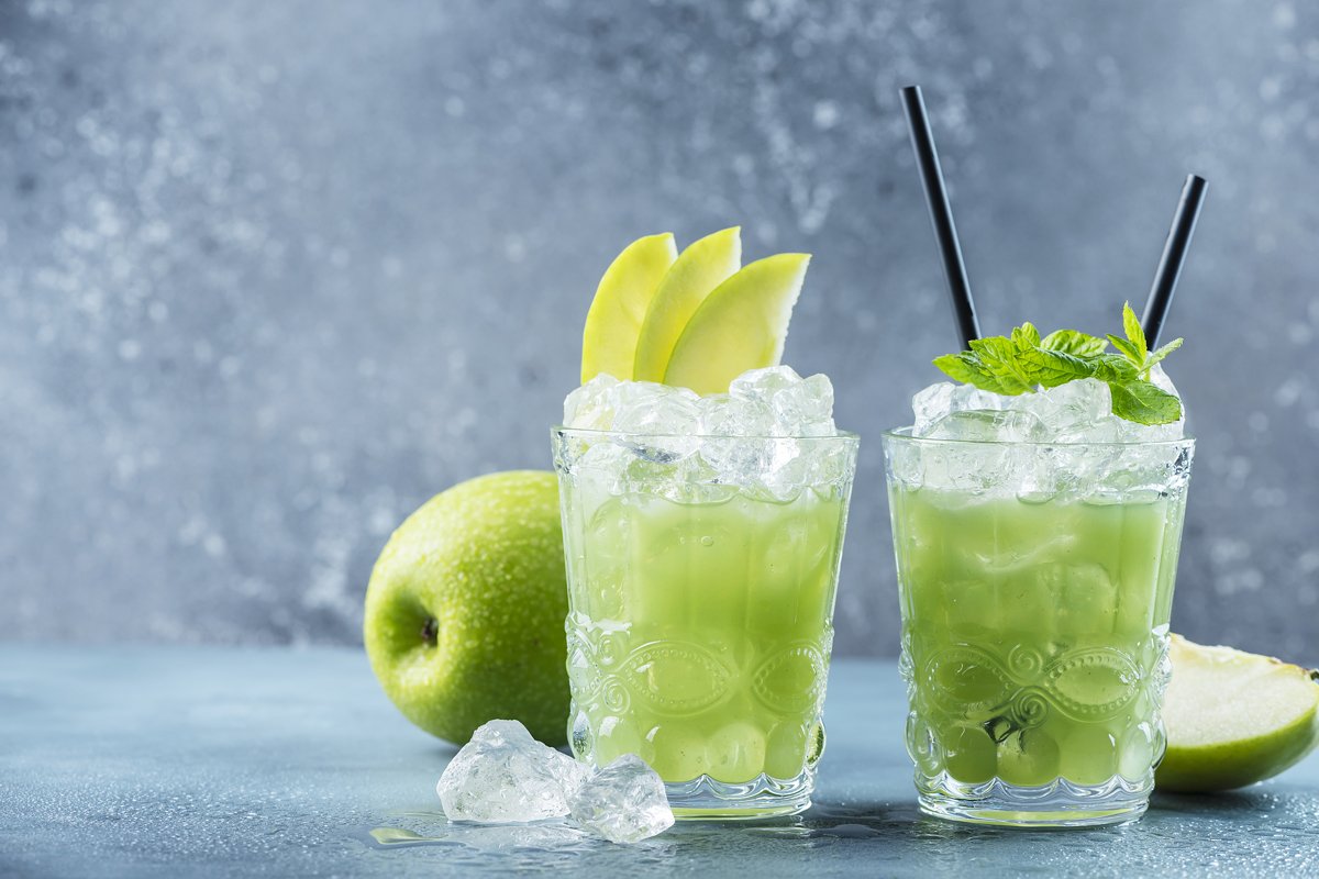 Green cocktail with ice and mint. Bar concept. Apple mojito example image 1