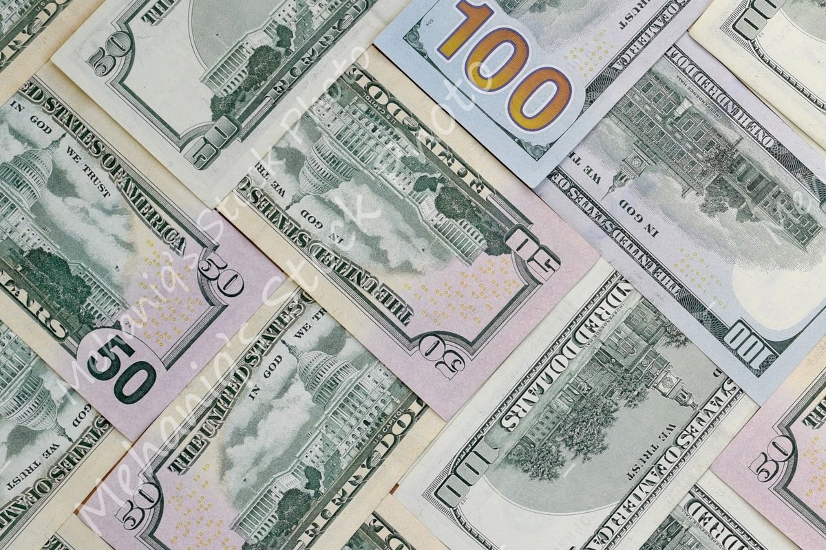 Many american dollar bills close up example image 1