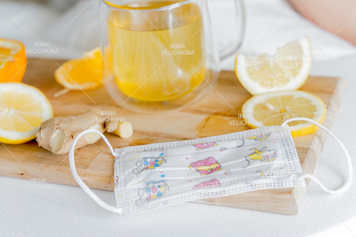 Cup of flu drugs, kids face mask. Tea, orange,lemon,ginger example image 1