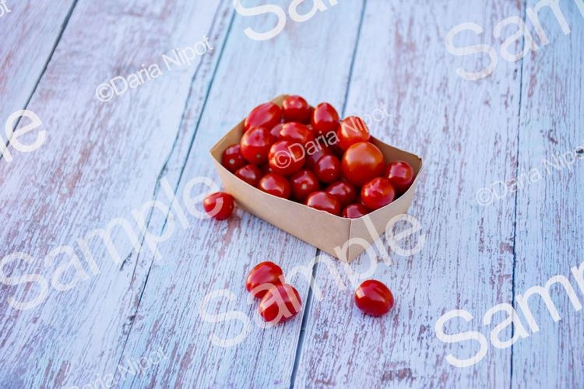 Cherry tomatoes in a recycleable paper box example image 1