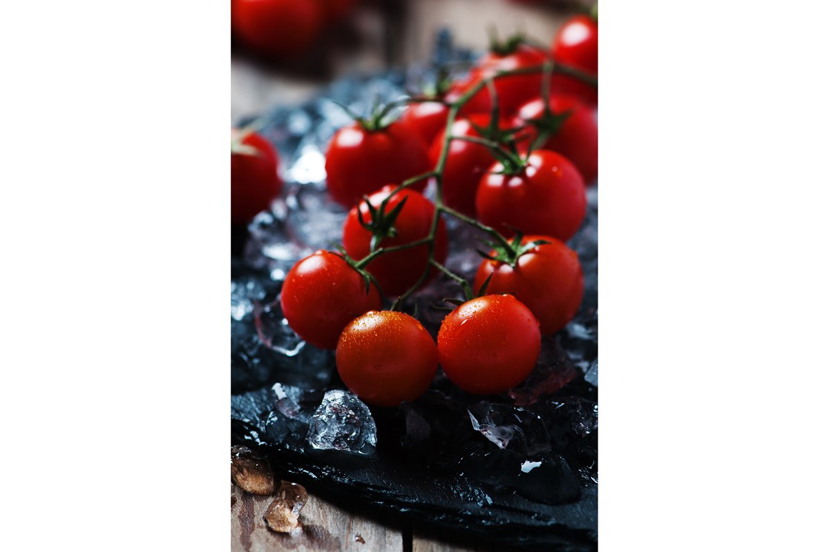 Sweet fresh tomatoes on the wooden table, selective focus example image 1
