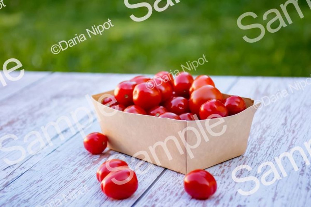 Cherry tomatoes in a recycleable paper box example image 1