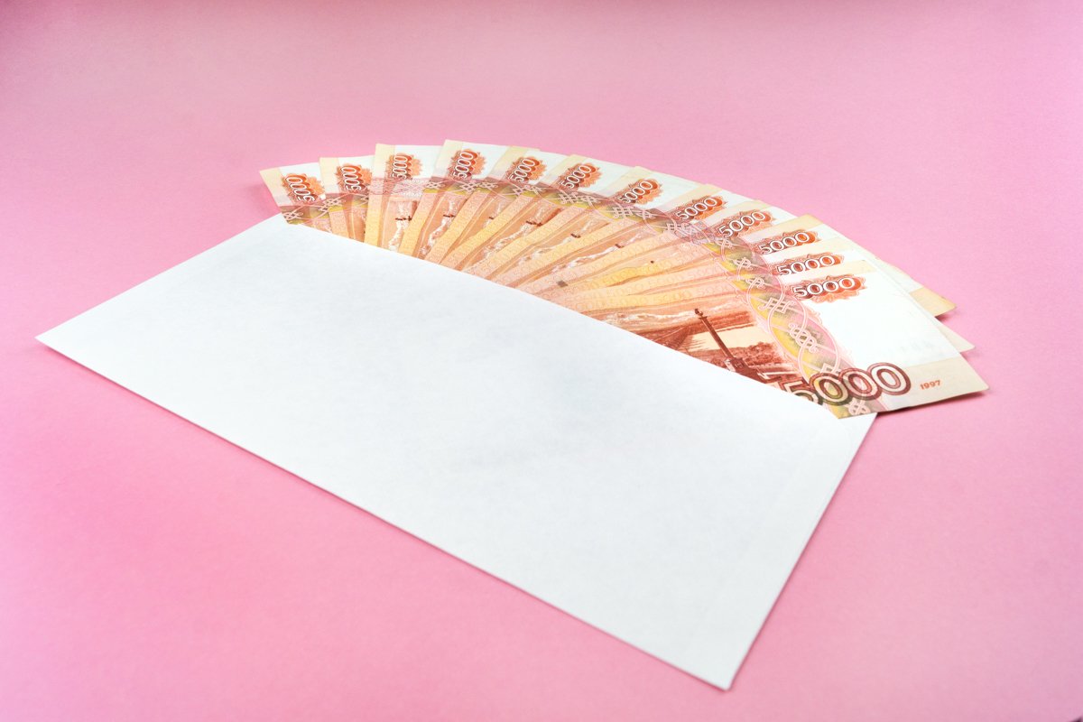 envelope with Russian currency on a pink background example image 1