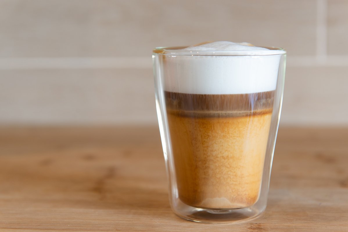multilayer coffee or cappuccino in a glass cup example image 1