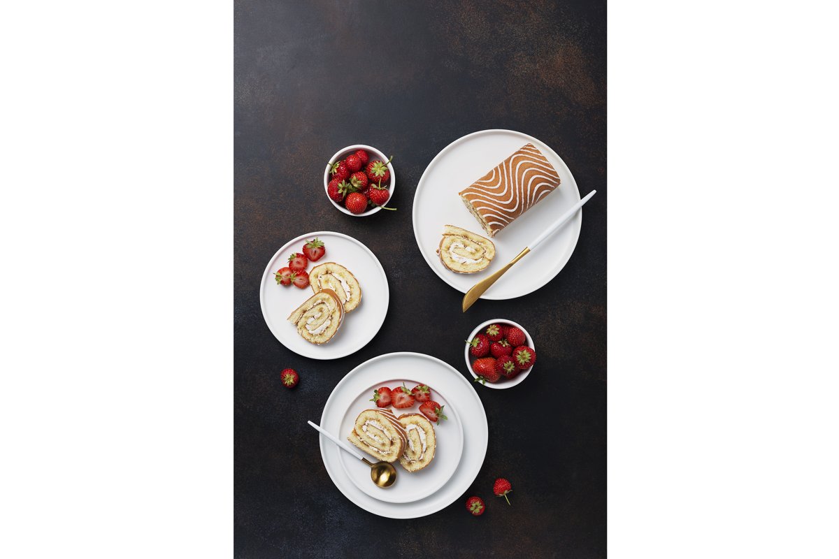 Sweet roll cake with white biscuit, cream and strawberry example image 1