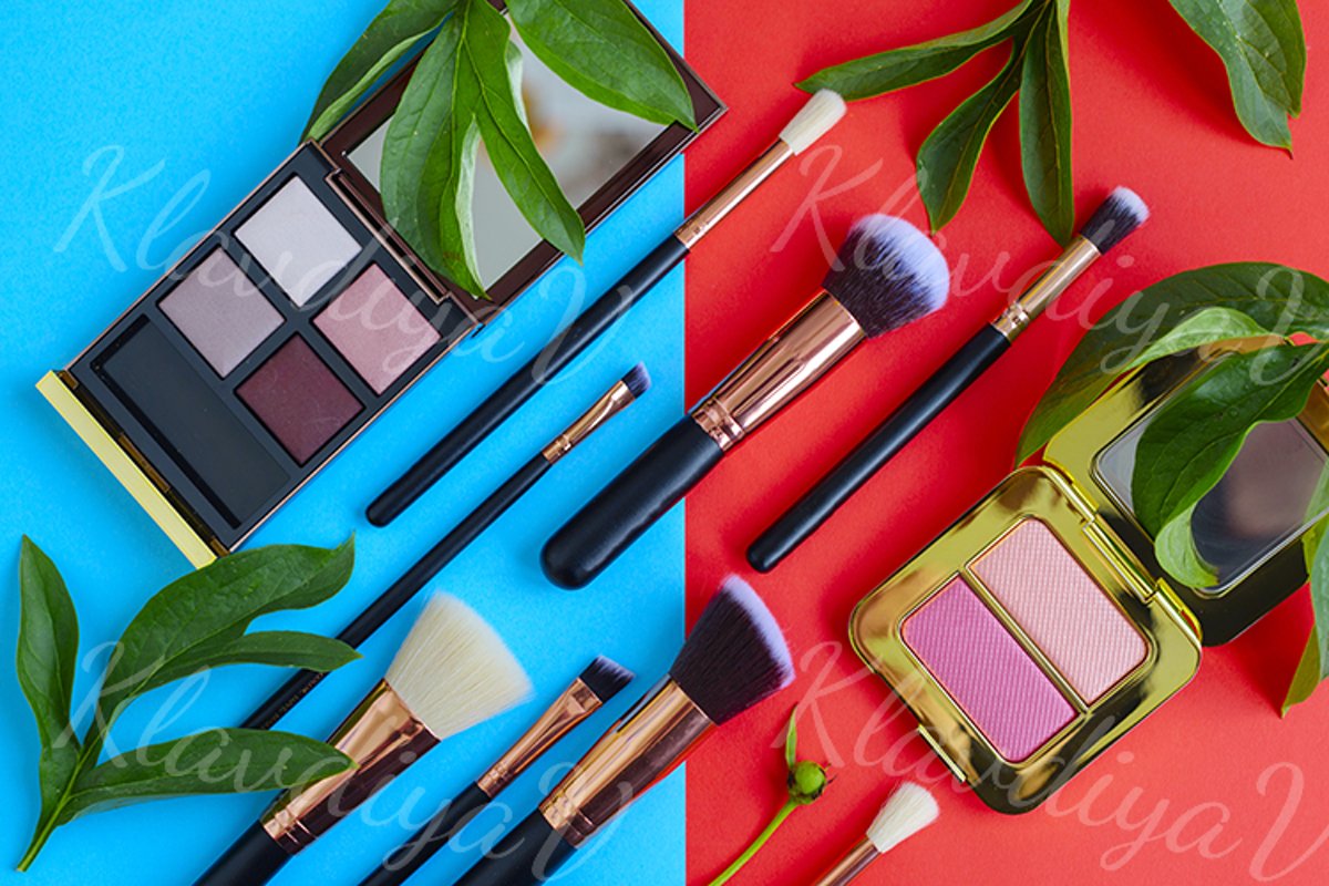 premium makeup brushes and blush on a colored background example image 1