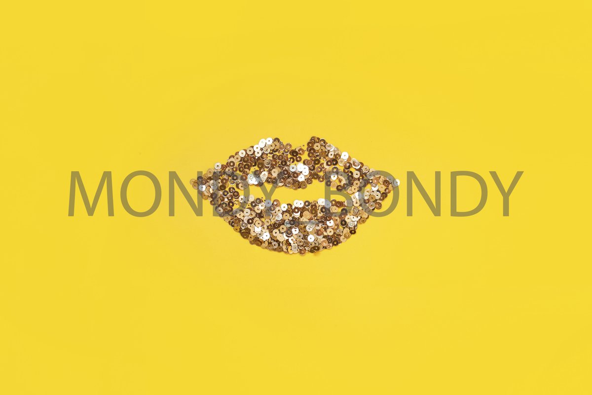 Lips from little golden confetti on a yellow background. example image 1