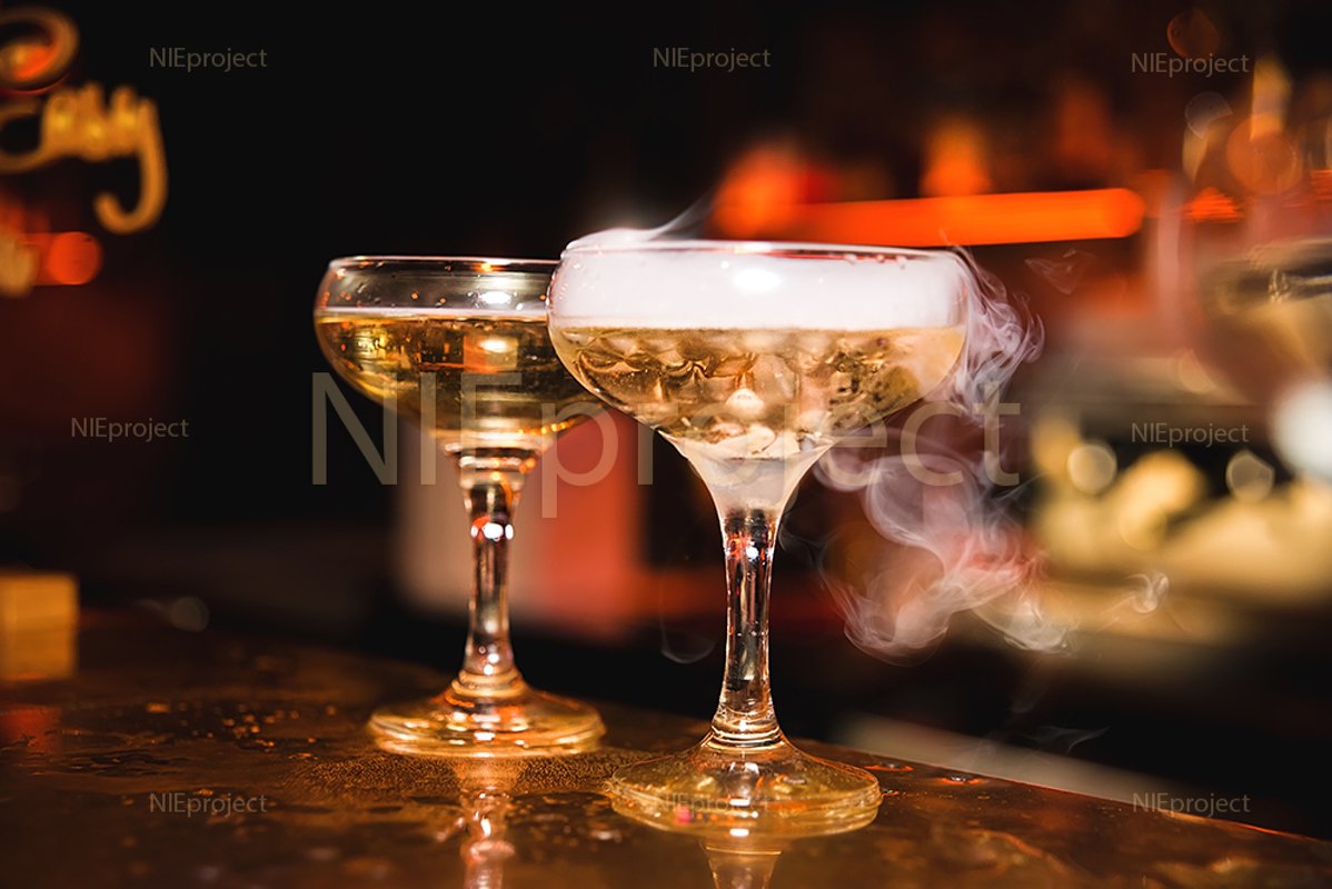 Alcohol drink with smoke in the night bar example image 1