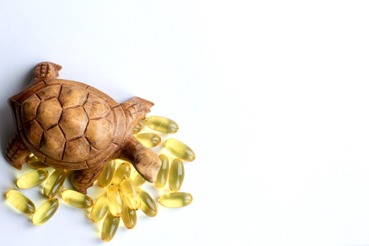 Omega 3 capsules lying on white background example image 1