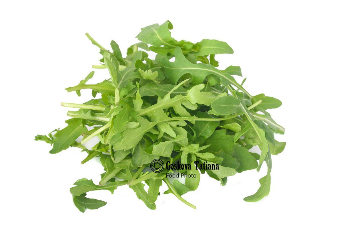 Photo of bunch of fresh arugula leaves isolated on white example image 1