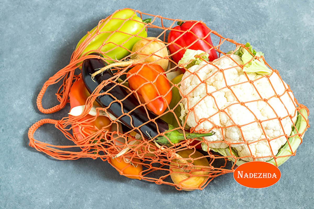 String bag with various fresh vegetables example image 1