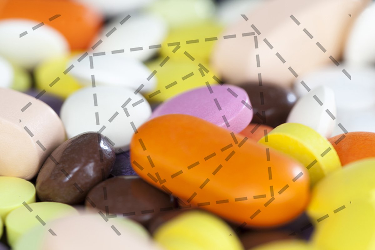 multi-colored tablets and pills example image 1