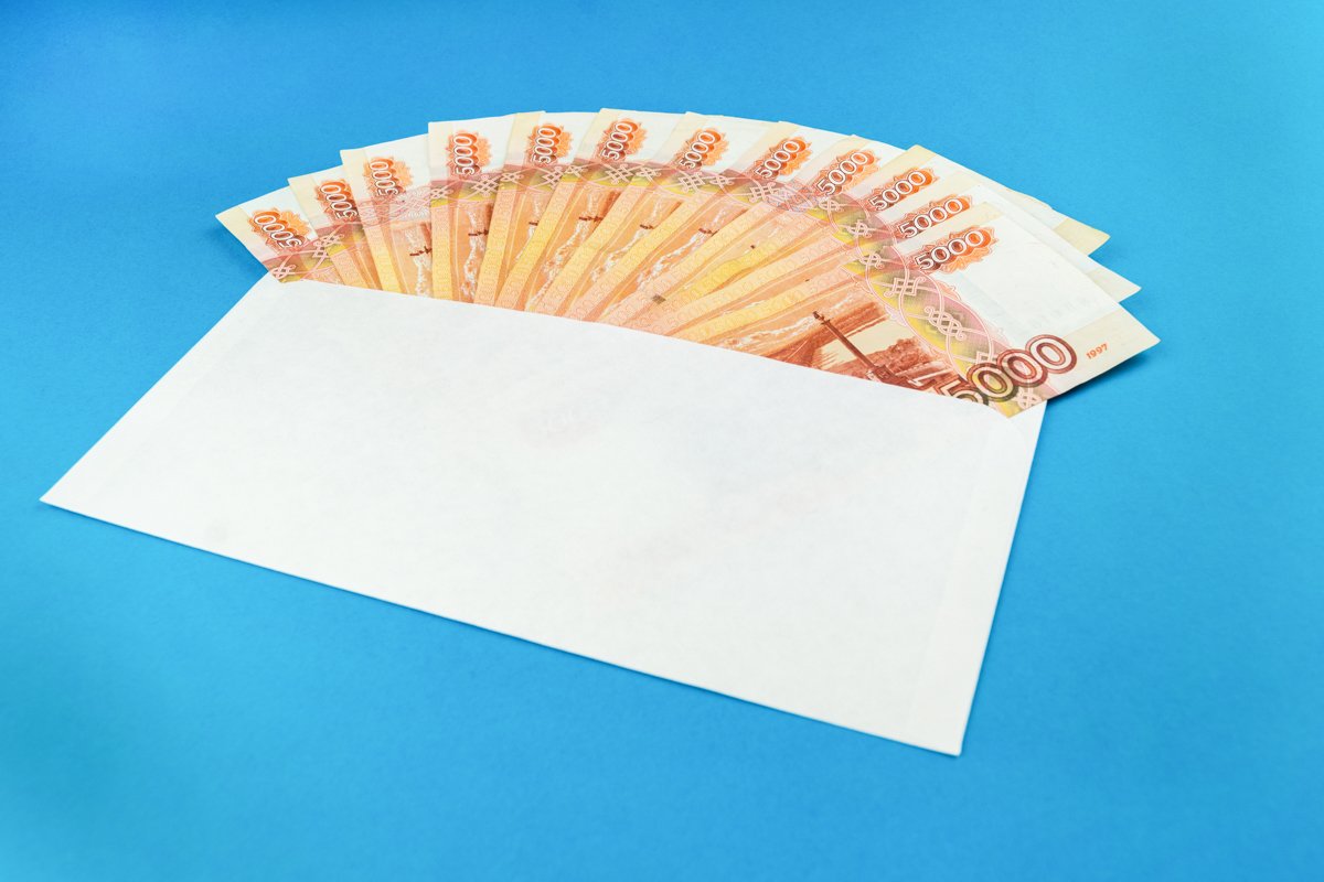 envelope with Russian currency on a blue background example image 1