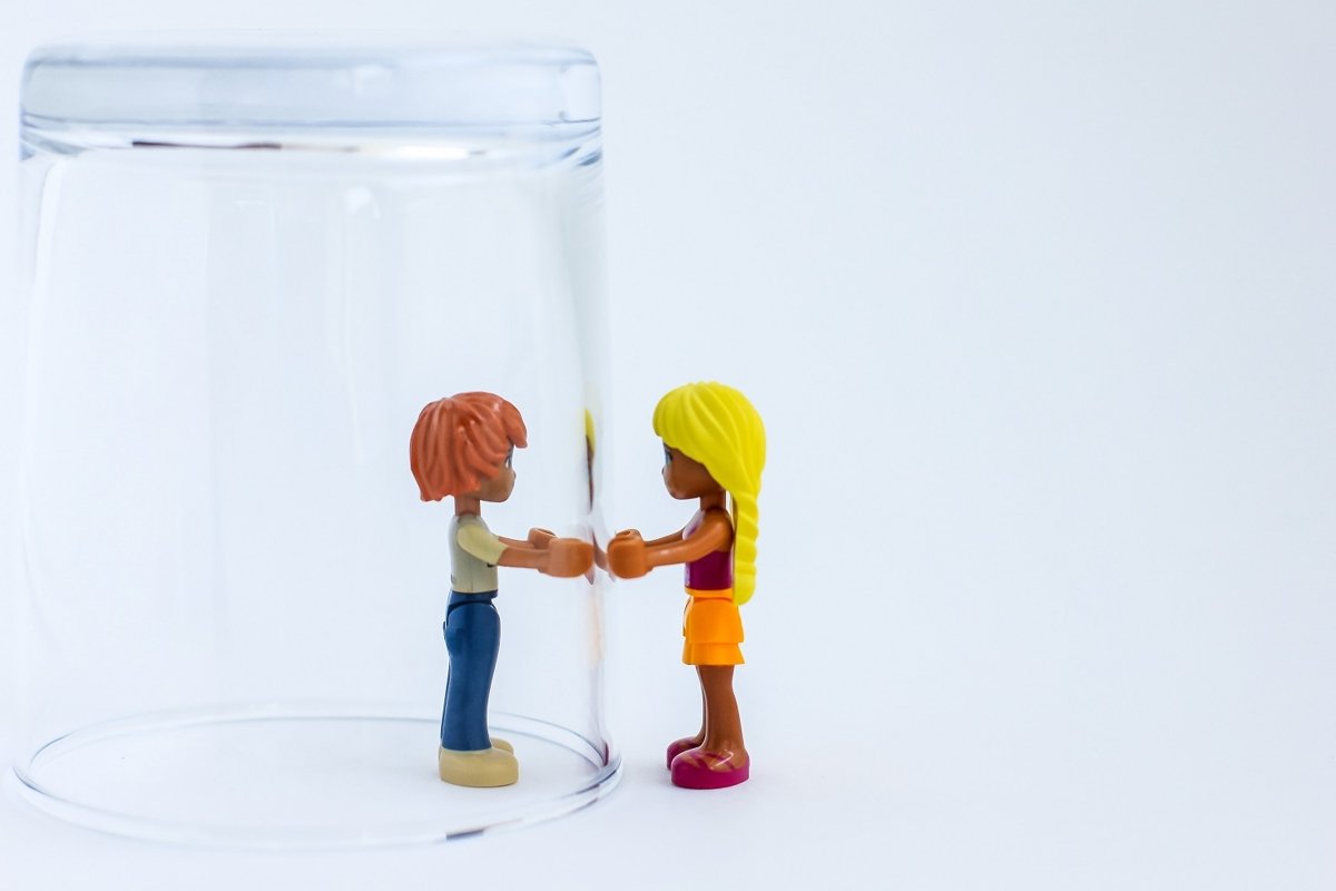 Toy people under a glass. example image 1
