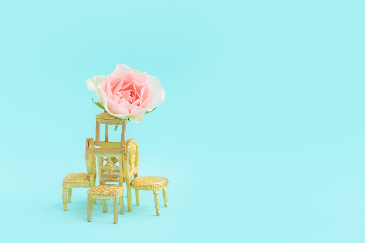 Small toy golden retro chairs.Rose flower.Blue greeting card example image 1