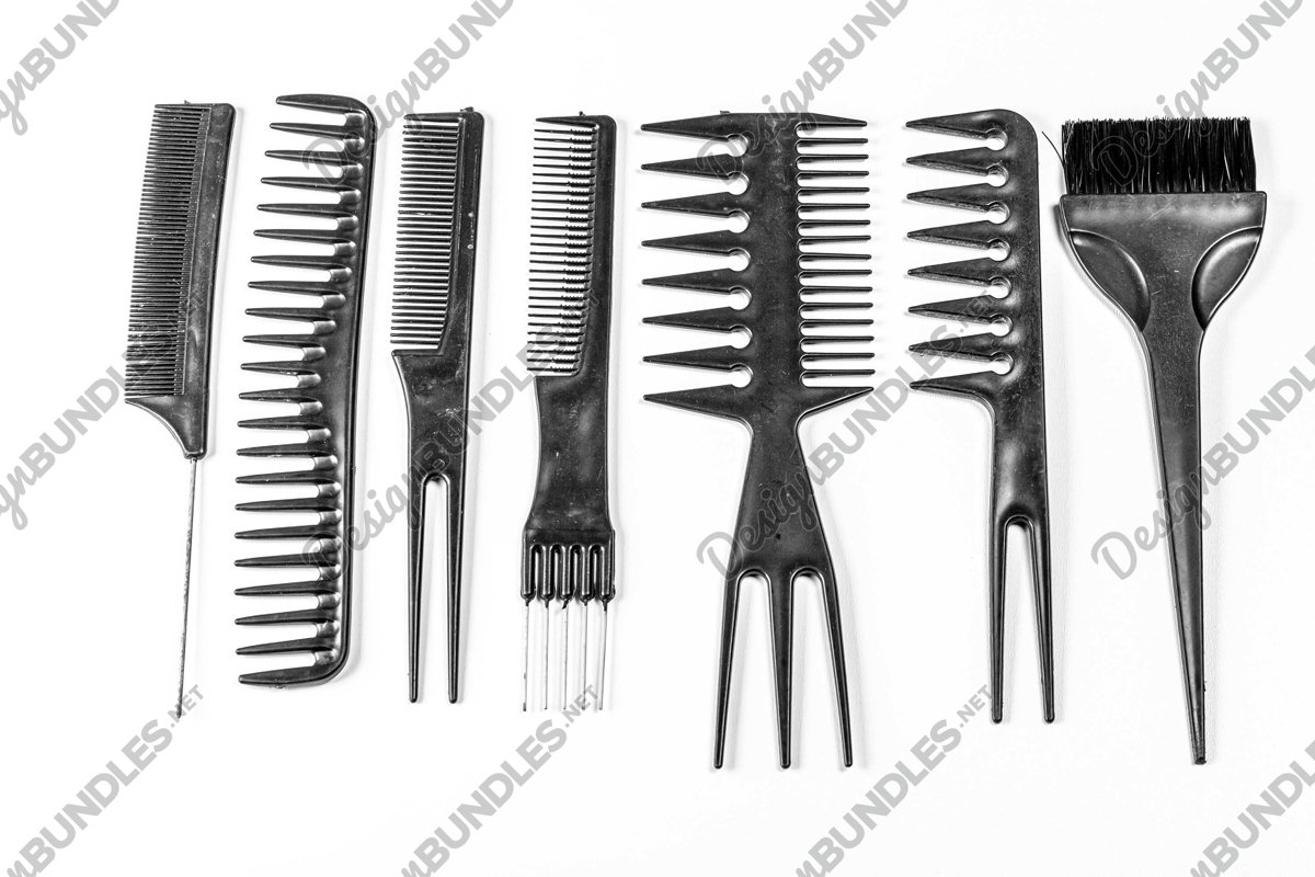 Stock Photo - Black comb isolated on white background example image 1