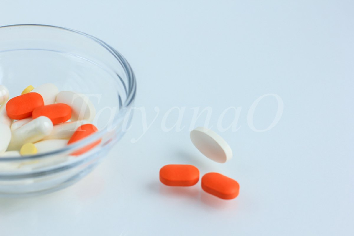 Multicolored pills, tablets against the virus, flu, disease example image 1