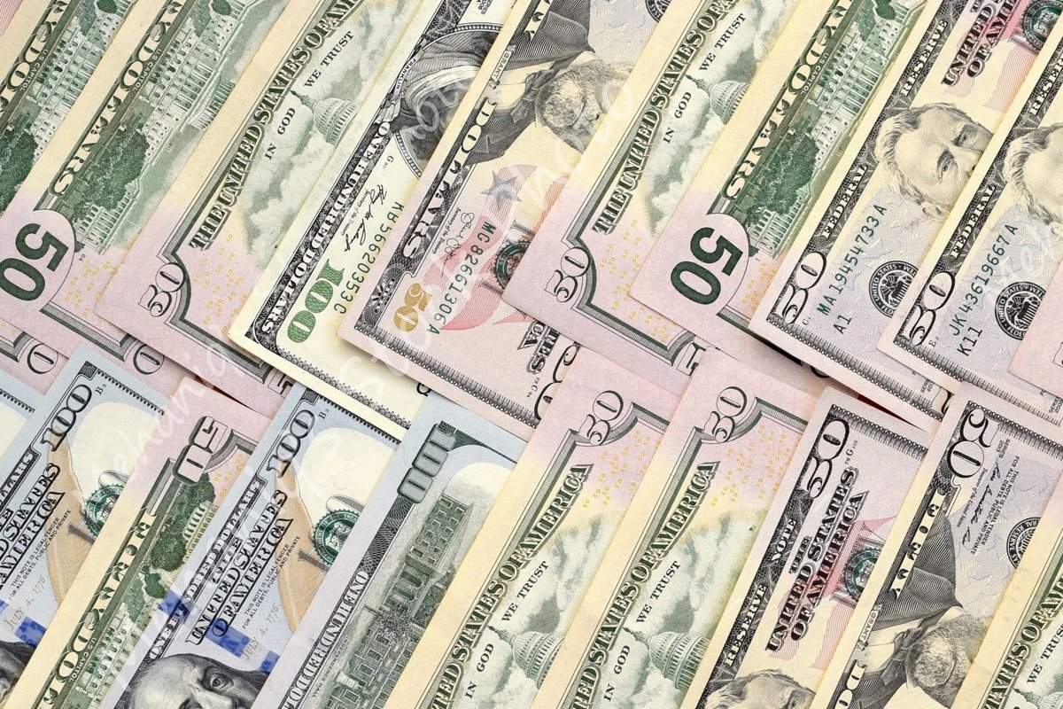 Many american dollar bills close up example image 1