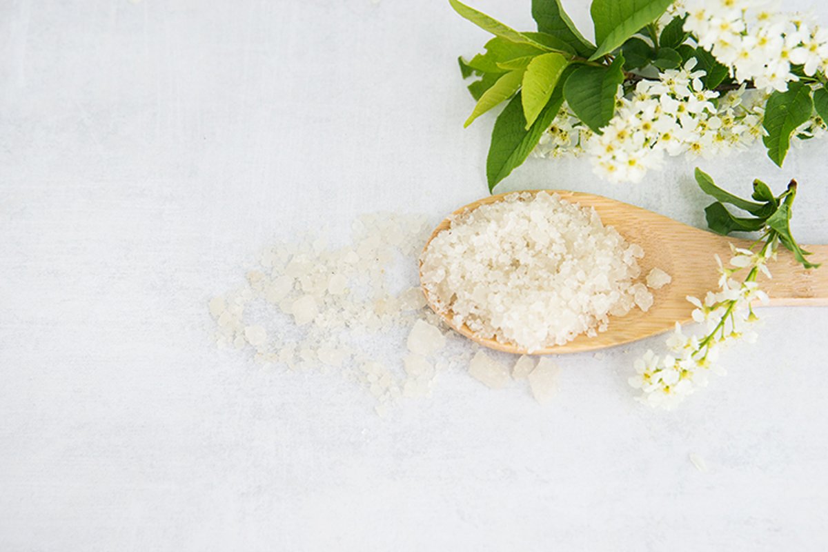 Spa-sea salt in a wooden spoon and shells example image 1