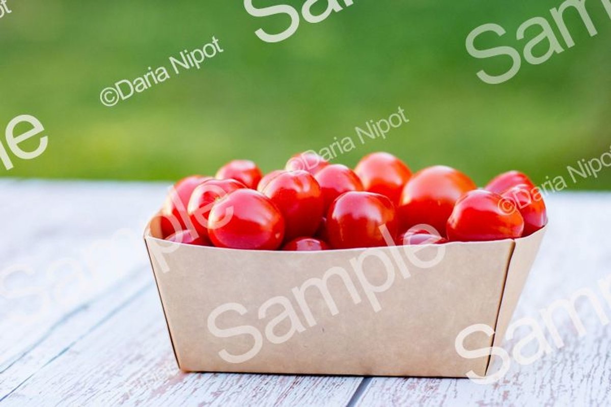 Cherry tomatoes in a recycleable paper box example image 1