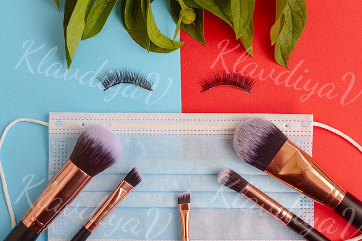 premium makeup brushes and blush on a colored background example image 1