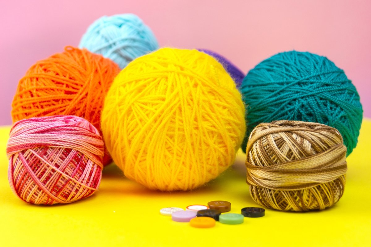 Colored balls of yarn. Yarn for knitting. example image 1