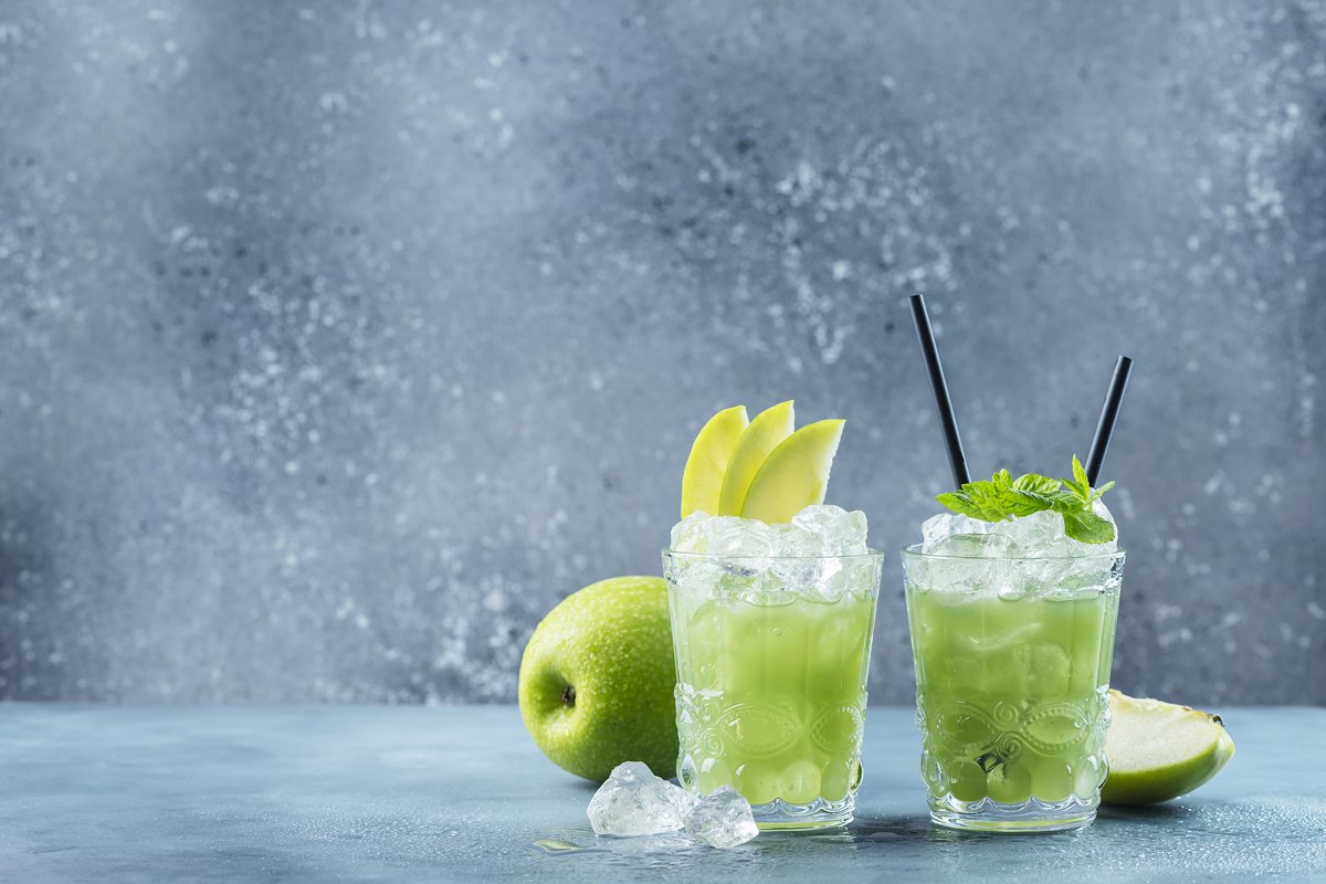 Green cocktail with ice and mint. Bar concept. Apple mojito example image 1