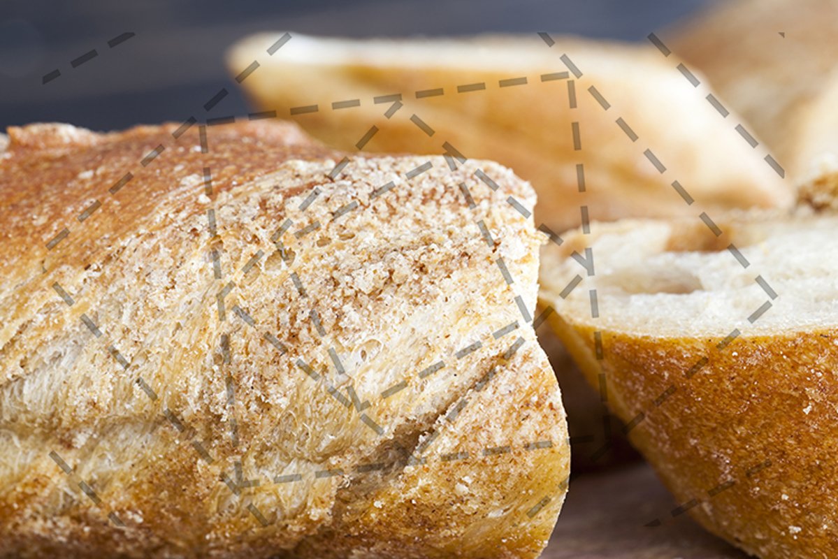 sliced long wheat baguette example image 1