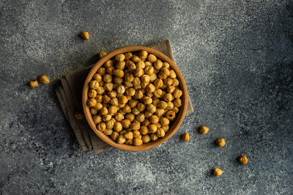 Different types of hazelnuts on dark wooden background example image 1