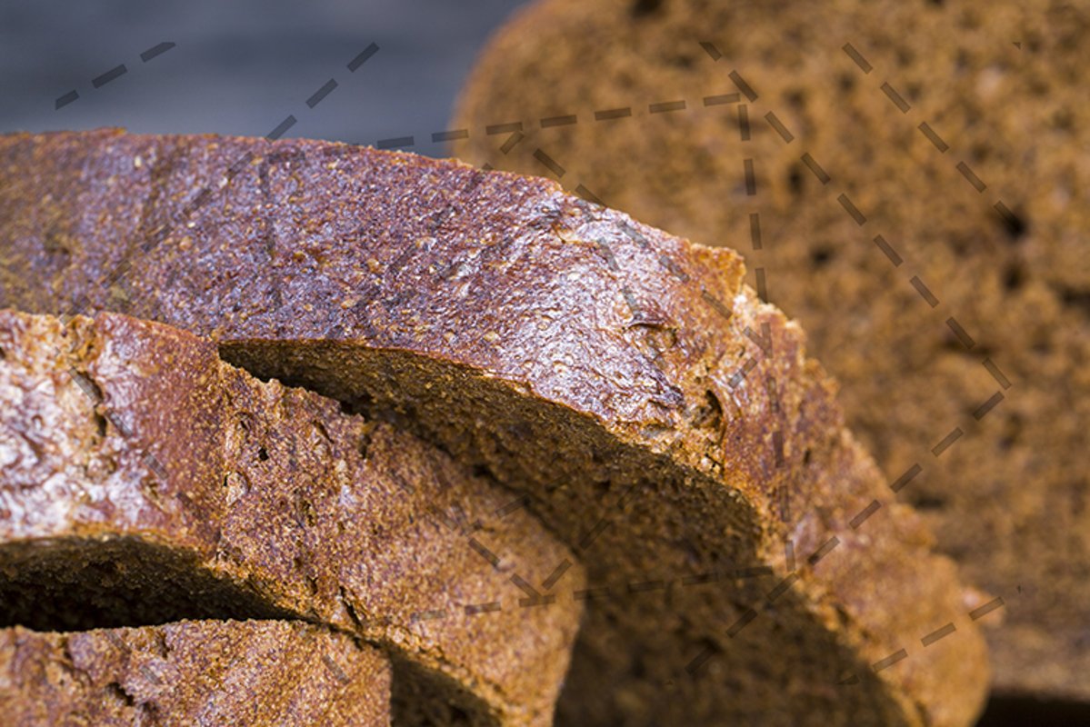 Cut loaf of bread. example image 1