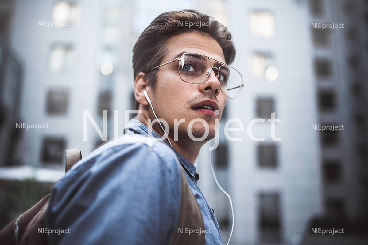 Happy man listening to music with headphones example image 1