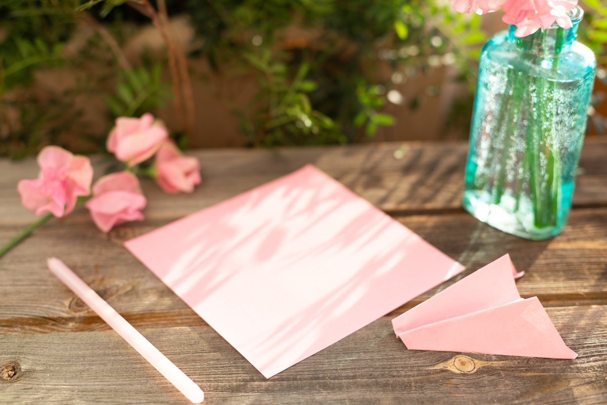 Pink sweet peas Lathyrus flowers in vase.Pen,note list, love example image 1