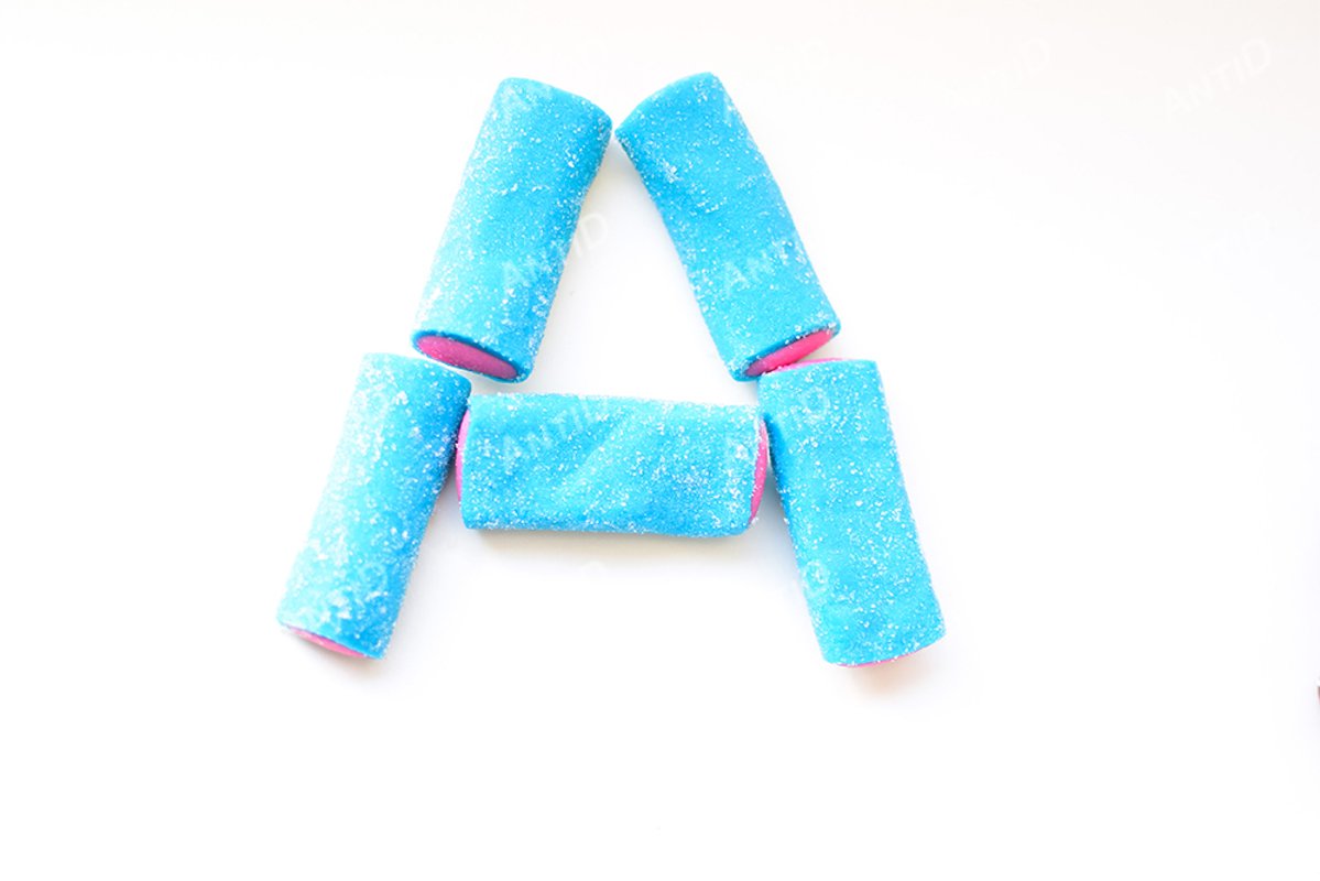 Letter A of licorice candy on a white background. example image 1