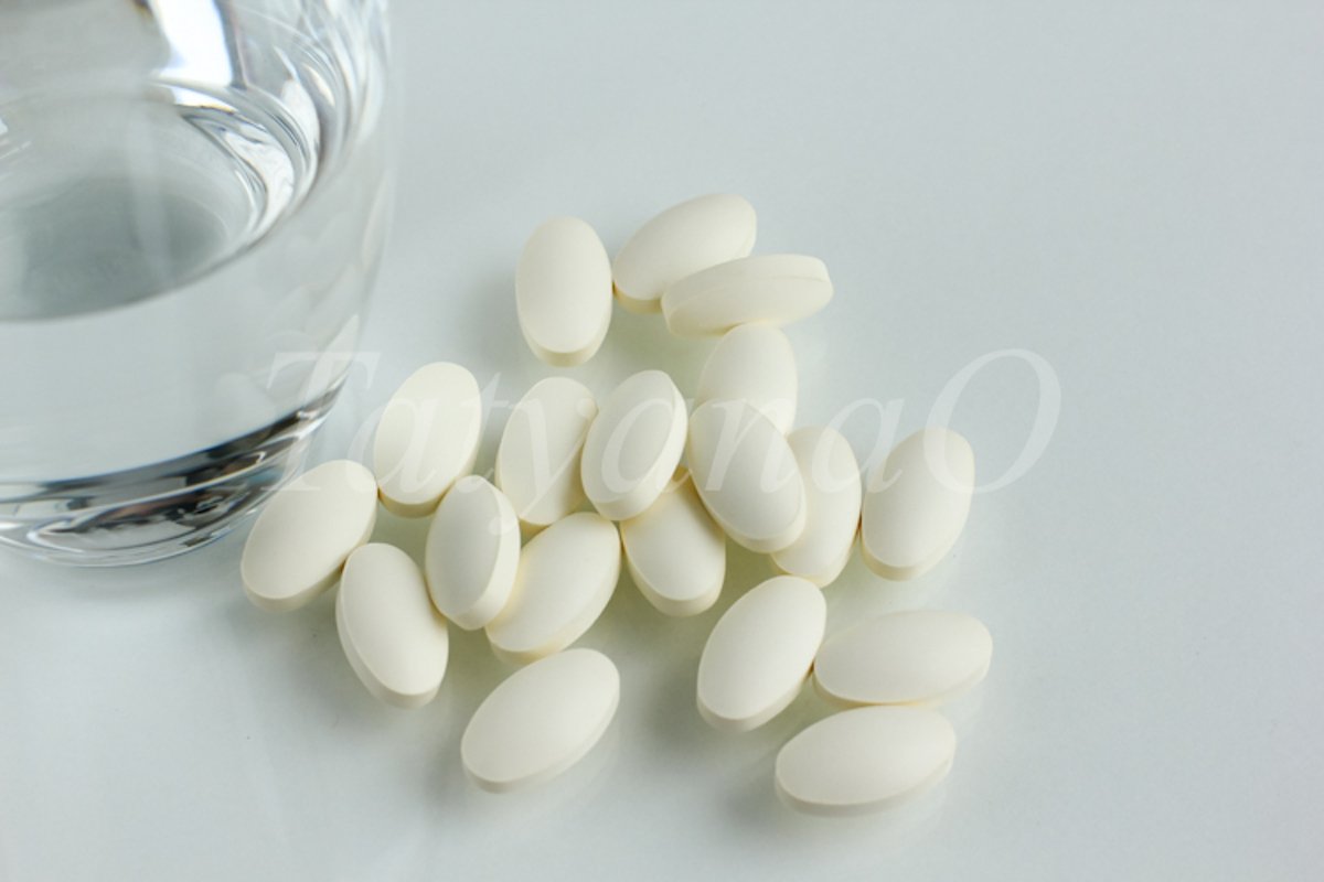 Multicolored pills, tablets against the virus, flu, disease example image 1