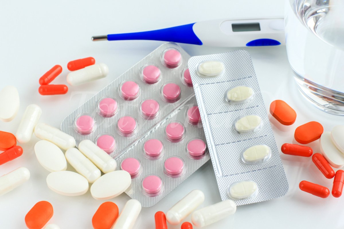 Multicolored pills, tablets against the virus, flu, disease example image 1