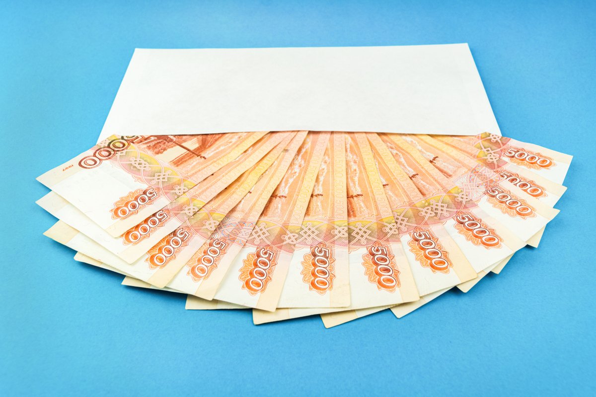 envelope with Russian currency on a blue background example image 1
