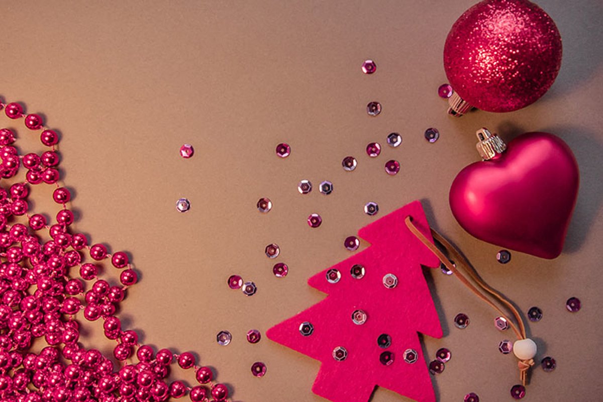 Red Christmas tree, beads, balls on a gray background. example image 1