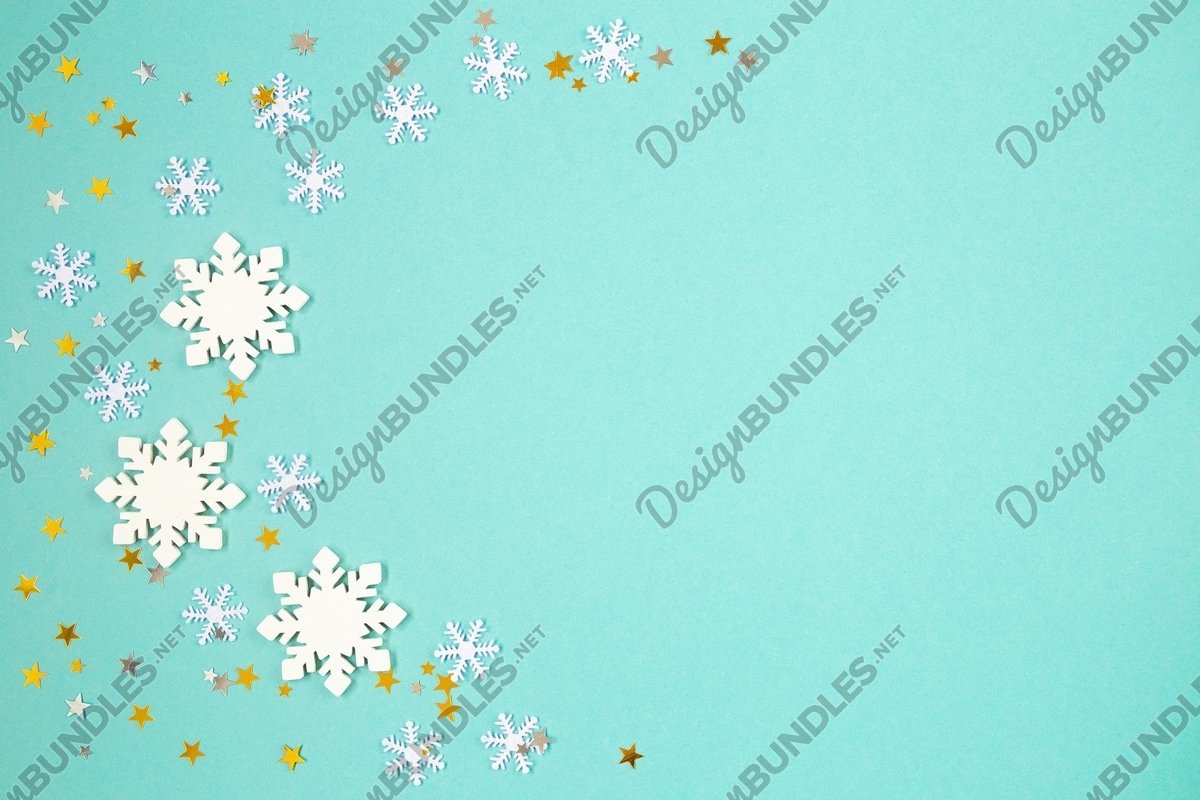 Flat lay photo of snowflake backgrounds on green paper example image 1
