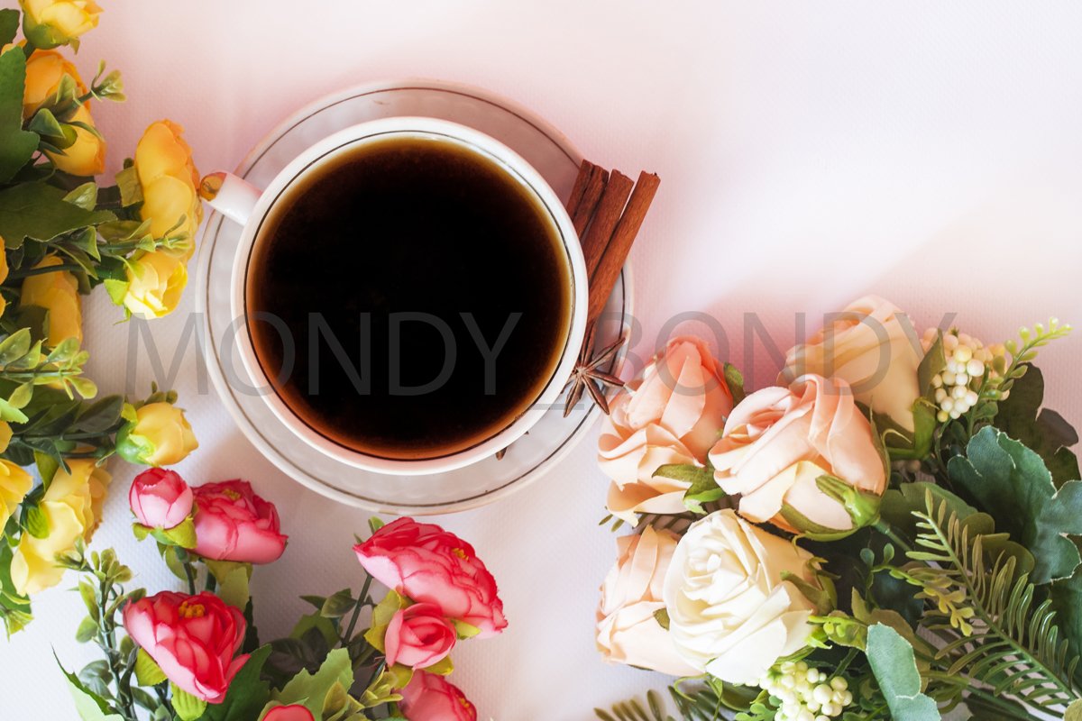 Flat Iay. Cup of coffee with cinnamon on a white background example image 1