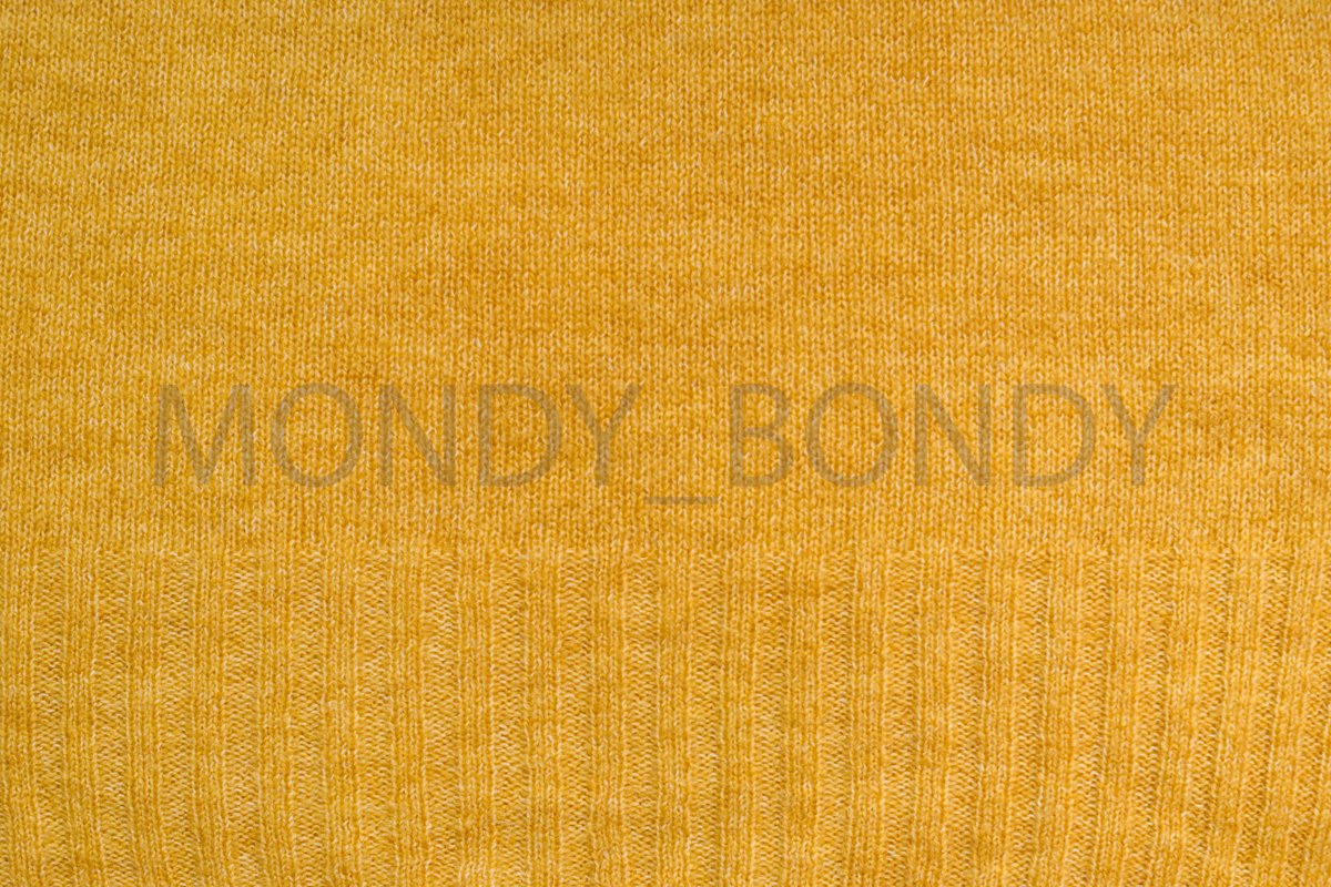 Texture of yellow woolen fabric closeup example image 1