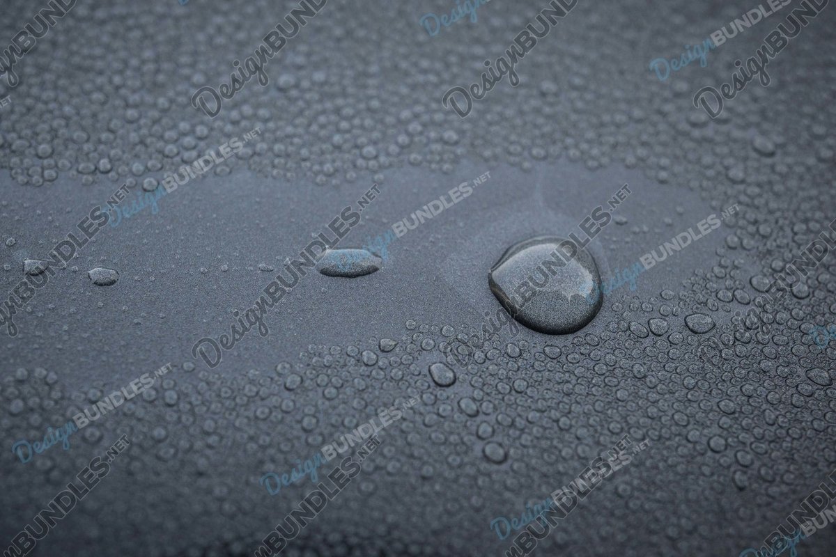 Stock Photo - Water drop on a steel background example image 1
