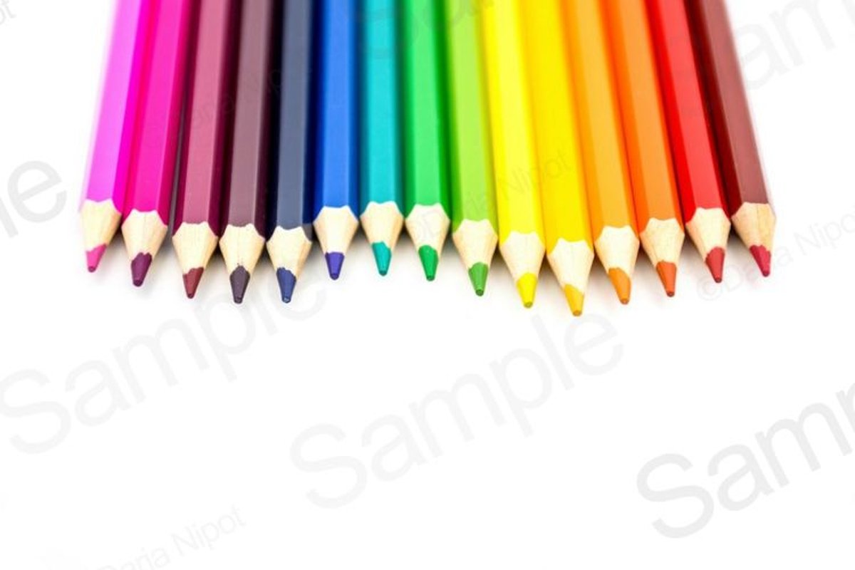 Rainbow color pencils on white background example image 1