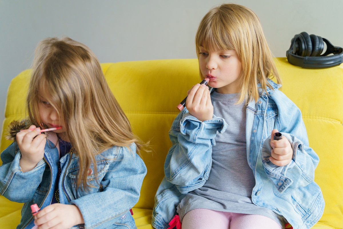 Hipster fashionable girls in denim jackets do mom's make up example image 1