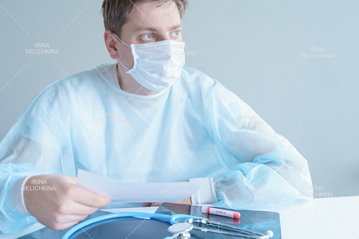 Doctor, patient in medical disposable hat, robe. Face mask example image 1
