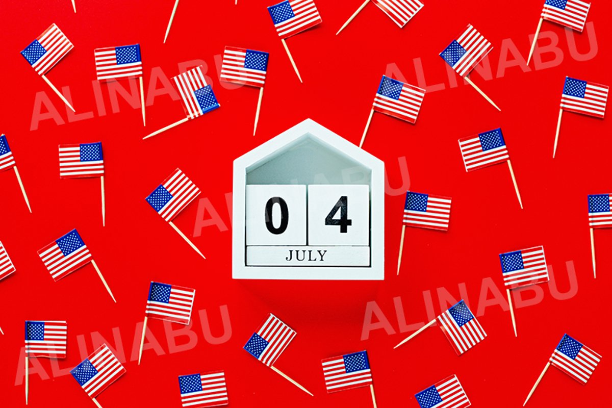 July 4th. USA flags on red background example image 1